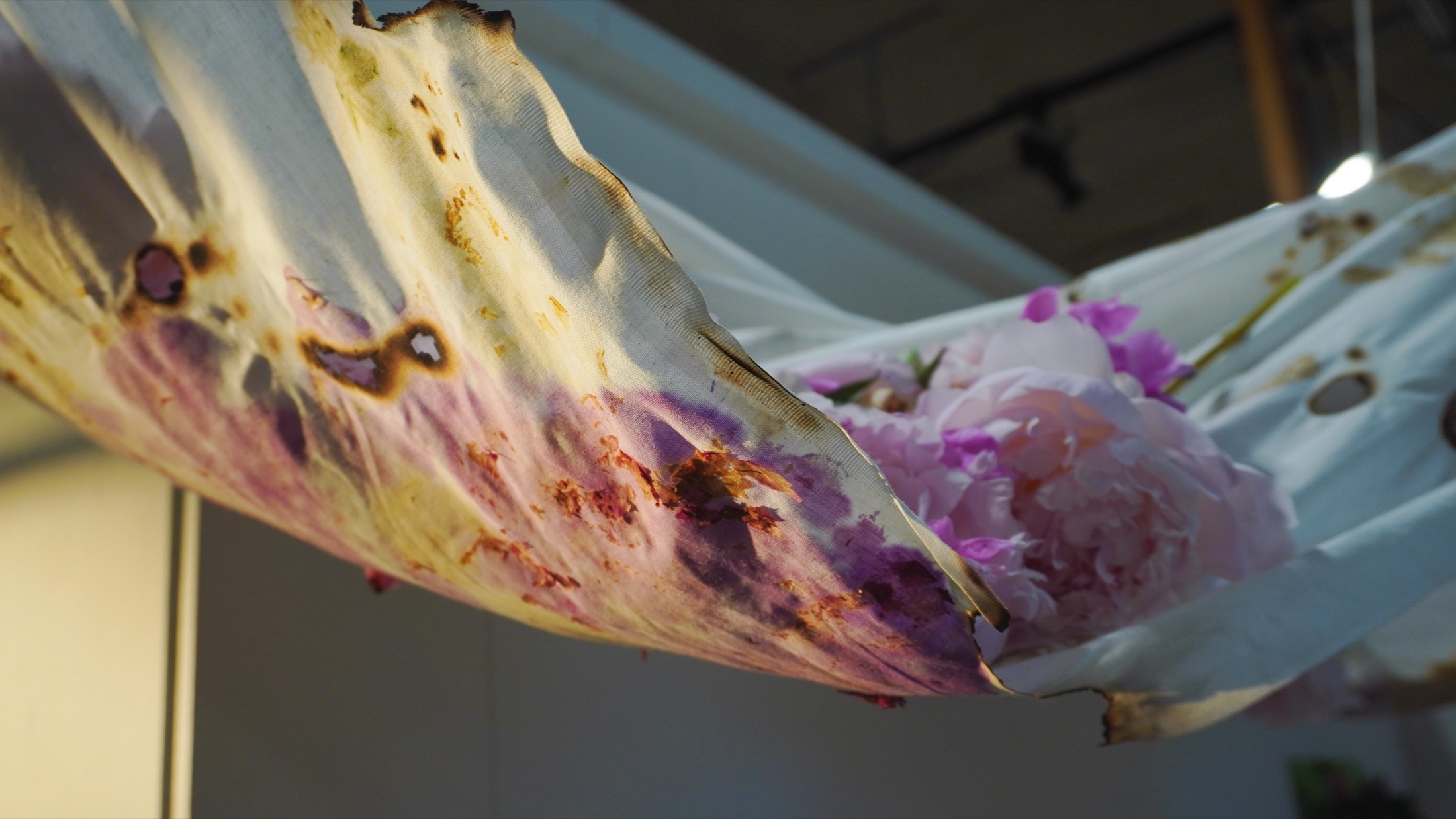 Hiding Your Flowers Behind, suspended fabric and flowers installation