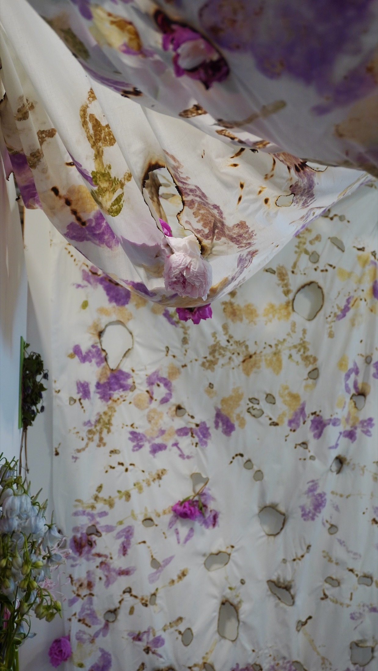 Vertical view of suspended floral fabric