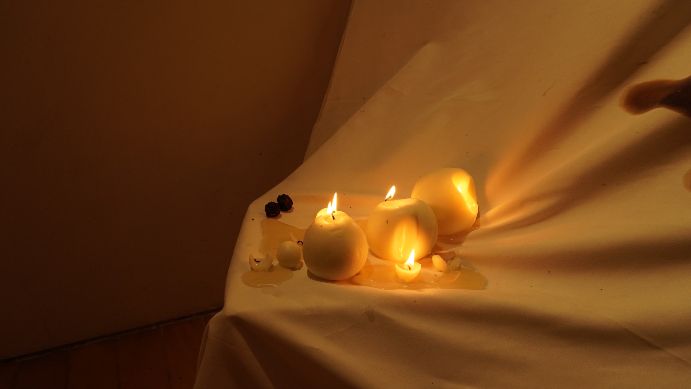 Candles within the still life installation