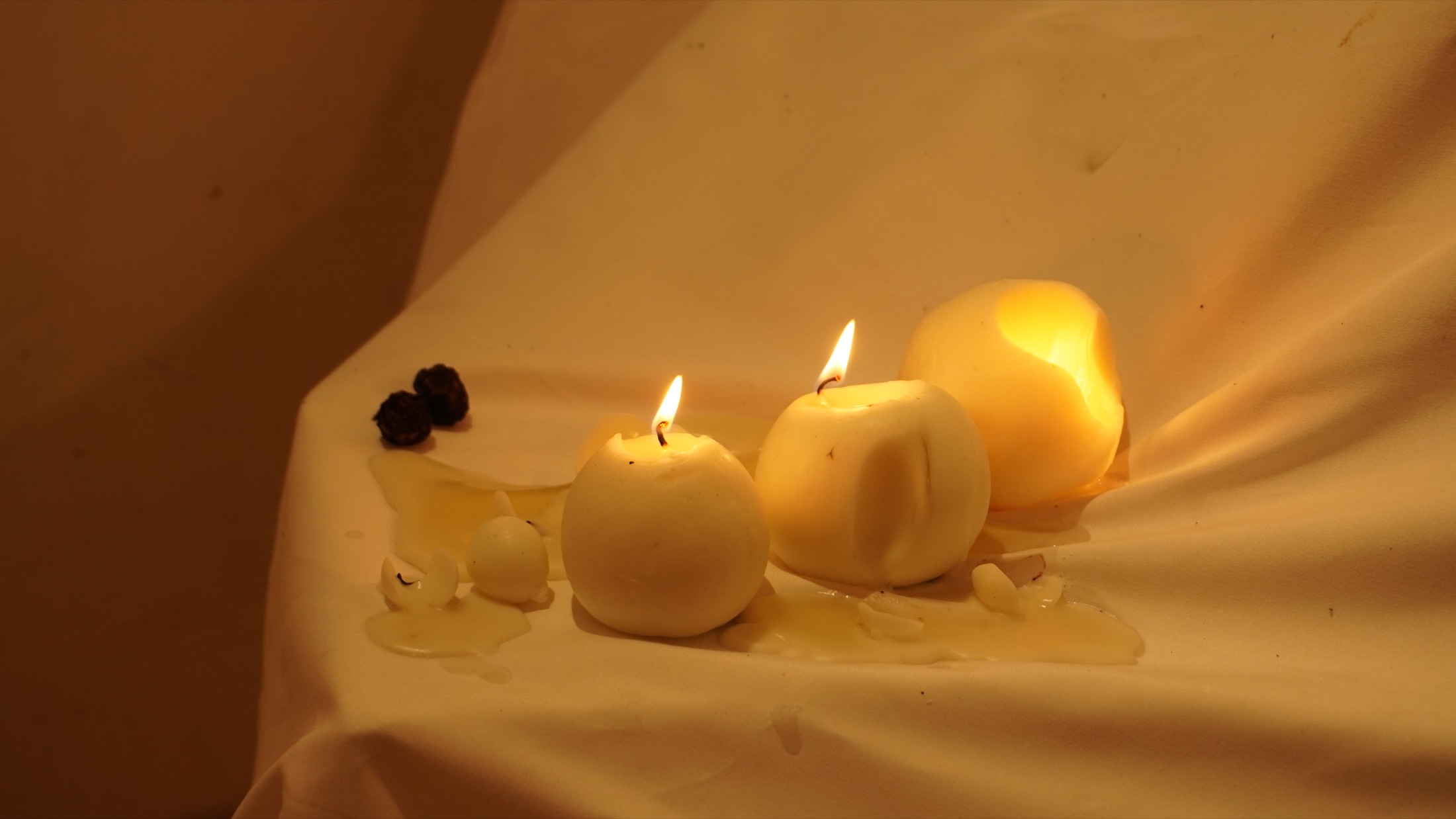 Candlelight and folded fabric detail